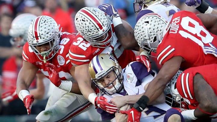 PASADENA, CA - JANUARY 01: Jake Browning #3 of the Washington Huskies is tackled during the second half in the Rose Bowl Game presented by Northwestern Mutual at the Rose Bowl on January 1, 2019 in Pasadena, California. (Photo by Sean M. Haffey/Getty Images) PASADENA, CA - JANUARY 01: Jake Browning #3 of the Washington Huskies is tackled during the second half in the Rose Bowl Game presented by Northwestern Mutual at the Rose Bowl on January 1, 2019 in Pasadena, California. (Photo by Sean M. Haffey/Getty Images)