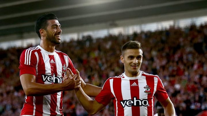 SOUTHAMPTON, ENGLAND - JULY 30: Graziano Pelle of Southampton (L) congratulates Dusan Tadic of Southampton (R) after he scores from a penalty to make it 2-0 during the UEFA Europa League Third Qualifying Round 1st Leg match between Southampton and Vitesse at St Mary's Stadium on July 30, 2015 in Southampton, England. (Photo by Jordan Mansfield/Getty Images)