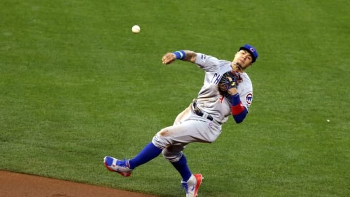Oct 11, 2016; San Francisco, CA, USA; Chicago Cubs third baseman Javier Baez (9) attempts a play during the third inning of game four of the 2016 NLDS playoff baseball game at AT&T Park. Mandatory Credit: Kelley L Cox-USA TODAY Sports