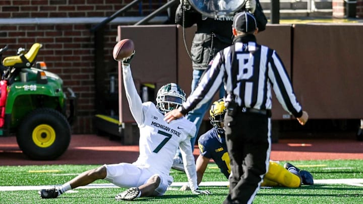 Michigan State’s Ricky White catches a pass on the sideline against Michigan during the fourth quarter on Saturday, Oct. 31, 2020, at Michigan Stadium in Ann Arbor.201031 Msu Um 164a