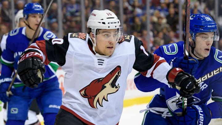 VANCOUVER, BC - FEBRUARY 21: Arizona Coyotes Center Jordan Weal (10) skates past Vancouver Canucks Center Adam Gaudette (88) during their NHL game at Rogers Arena on February 21, 2019 in Vancouver, British Columbia, Canada. Arizona won 3-2 in overtime. (Photo by Derek Cain/Icon Sportswire via Getty Images)