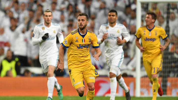 Miralem Pjanic of Juventus in action during the UEFA Champions League quarter final second leg match between Real Madrid (Photo by Etsuo Hara/Getty Images)