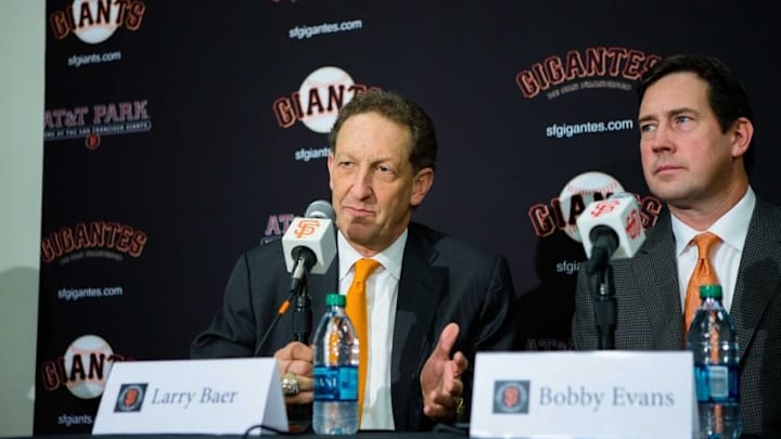 Dec 17, 2015; San Francisco, CA, USA; San Francisco Giants chief executive officer Larry Baer and senior vice president and general manager Bobby Evans announce the signing of pitcher Johnny Cueto at a press conference at AT&T Park. Mandatory Credit: John Hefti-USA TODAY Sports