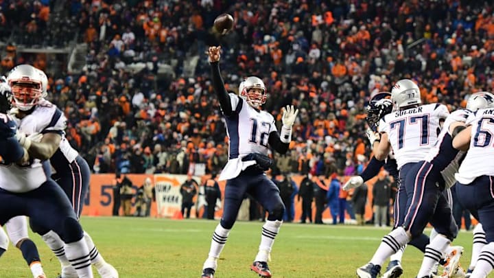 Dec 18, 2016; Denver, CO, USA; New England Patriots quarterback Tom Brady (12) attempts a pass in the second half against the Denver Broncos at Sports Authority Field. Mandatory Credit: Ron Chenoy-USA TODAY Sports