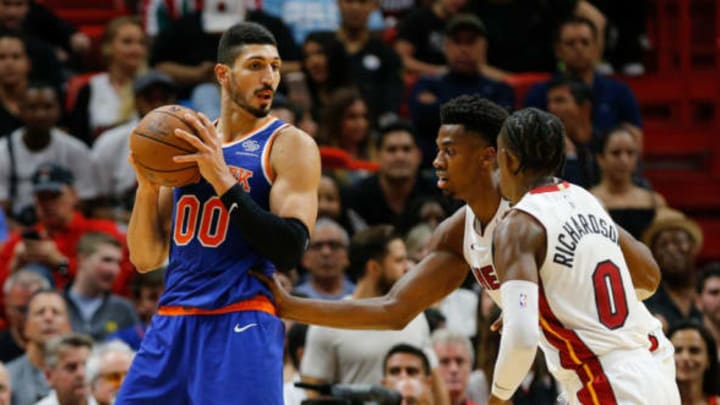 MIAMI, FL – OCTOBER 24: Enes Kanter #00 of the New York Knicks is defended by Hassan Whiteside #21 and Josh Richardson #0 of the Miami Heat during the second half at American Airlines Arena on October 24, 2018 in Miami, Florida. NOTE TO USER: User expressly acknowledges and agrees that, by downloading and or using this photograph, User is consenting to the terms and conditions of the Getty Images License Agreement. (Photo by Michael Reaves/Getty Images)