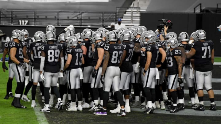 LAS VEGAS, NEVADA - NOVEMBER 22: The Las Vegas Raiders huddle during warmups before a game against the Kansas City Chiefs at Allegiant Stadium on November 22, 2020 in Las Vegas, Nevada. The Chiefs defeated the Raiders 35-31. (Photo by Ethan Miller/Getty Images)