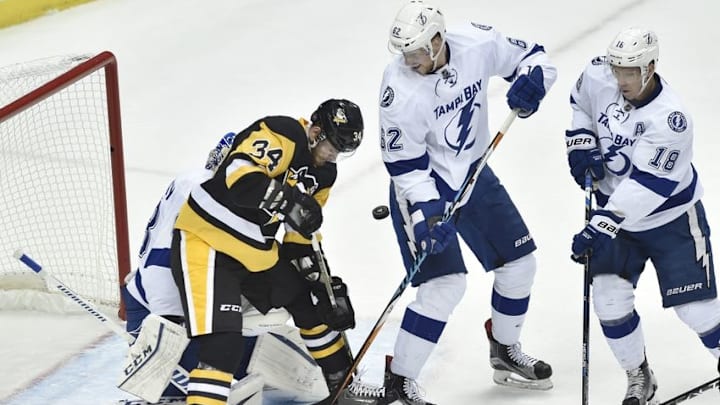 May 13, 2016; Pittsburgh, PA, USA; Pittsburgh Penguins right wing Tom Kuhnhackl (34) tries the deflect the puck past Tampa Bay Lightning goalie Andrei Vasilevskiy (88) as Andrej Sustr (62) and Ondrej Palat (18) defend during the second period in game one of the Eastern Conference Final of the 2016 Stanley Cup Playoffs at CONSOL Energy Center. Tampa Bay won 3-1. Mandatory Credit: Don Wright-USA TODAY Sports