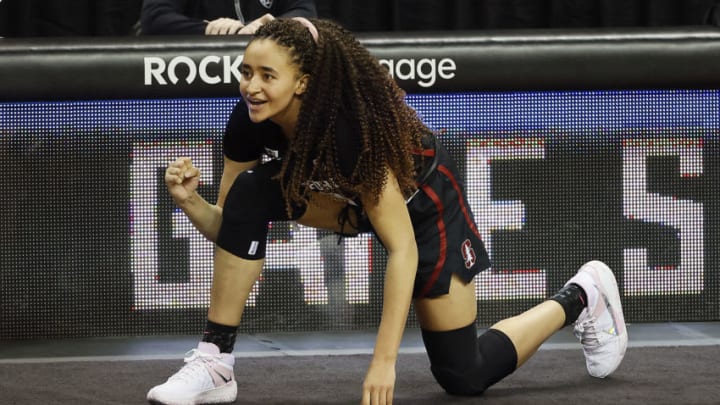 EUGENE, OREGON - FEBRUARY 15: Haley Jones #30 of the Stanford Cardinal cheers for her team as she waits to enter the game against the Oregon Ducks during the second half at Matthew Knight Arena on February 15, 2021 in Eugene, Oregon. (Photo by Soobum Im/Getty Images)