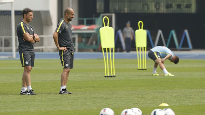 BEIJING, CHINA - JULY 24: Manchester City's manager Pep Guardiola attends the pre-game training ahead of the 2016 International Champions Cup match between Manchester City and Manchester United at Olympic Sports Center Stadium on July 24, 2016 in Beijing, China. (Photo by Lintao Zhang/Getty Images)
