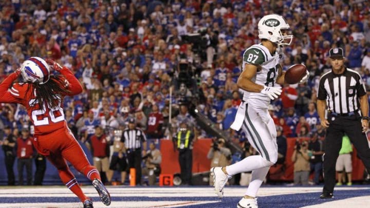 Sep 15, 2016; Orchard Park, NY, USA; New York Jets wide receiver Eric Decker (87) scores a touchdown as Buffalo Bills cornerback Ronald Darby (28) reacts during the first half at New Era Field. Mandatory Credit: Kevin Hoffman-USA TODAY Sports