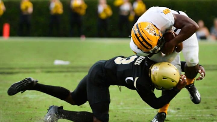 Wofford's Jaheem Hazel takes down Kennesaw State's Xavier Shepherd. Spartanburg Herald-Journal.