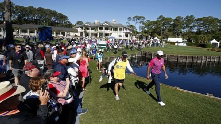 Apr 17, 2016; Hilton Head, SC, USA; Jason Day walks with his caddie Colin Swatton after Day