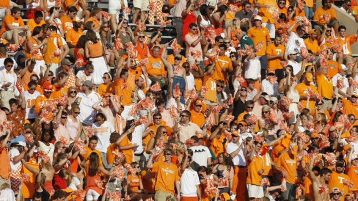 KNOXVILLE, TN - SEPTEMBER 15: Fans cheers for the Tennessee Volunteers during their game against the Florida Gators at Neyland Stadium on September 15, 2012 in Knoxville, Tennessee. (Photo by John Sommers II/Getty Images)