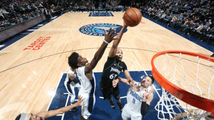 MINNEAPOLIS, MN - JANUARY 4: Taj Gibson #67 of the Minnesota Timberwolves shoots the ball against the Orlando Magic on January 4, 2019 at Target Center in Minneapolis, Minnesota. NOTE TO USER: User expressly acknowledges and agrees that, by downloading and or using this Photograph, user is consenting to the terms and conditions of the Getty Images License Agreement. Mandatory Copyright Notice: Copyright 2019 NBAE (Photo by David Sherman/NBAE via Getty Images)