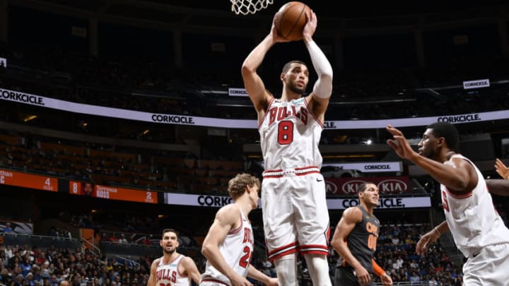 ORLANDO, FL - DECEMBER 23: Zach LaVine #8 of the Chicago Bulls grabs the rebound against the Orlando Magic on December 23, 2019 at Amway Center in Orlando, Florida. NOTE TO USER: User expressly acknowledges and agrees that, by downloading and or using this photograph, User is consenting to the terms and conditions of the Getty Images License Agreement. Mandatory Copyright Notice: Copyright 2019 NBAE (Photo by Fernando Medina/NBAE via Getty Images)
