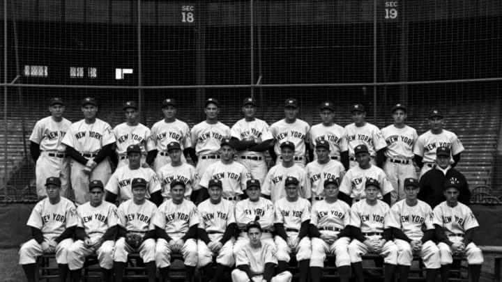 NEW YORK - SEPTEMBER, 1939: Members of the New York Yankees pose for a portrait on September, 1939 prior to the start of the World Series against the Cincinnati Reds at Yankee Stadium in New York, New York. Those pictured include (L to R) (first row) Warren "Buddy" Rosar, Charlie Keller, Spurgeon "Spud" Chandler, Jake Powell, coach Arthur Fletcher, manager Joe McCarthy, coach Earle Combs, coach John Schulte, Red Rolfe, Ellsworth "Babe" Dahlgren, Frank Crosetti, batboy Tim Sullivan, (second row) Irving "Bump" Hadley, Monte Pearson, Marius Russo, Lou Gehrig, George Selkirk, Bill Knickerbocker, trainer Doc Painter, (third row) Bill Dickey, Charles "Red" Ruffing, Joe DiMaggio, Oral Hildebrand, Steve Sundra, Paul Schreiber, Johnny Murphy, Vernon "Lefty" Gomez, Atley Donald, Tom Henrich, Arndt Jorgens. 1939 New York Yankees3901 (Photo by: Kidwiler Collection/Diamond Images/Getty Images)