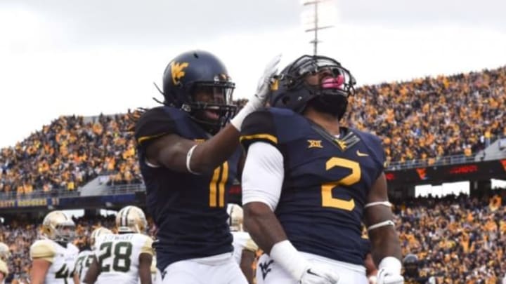 Oct 18, 2014; Morgantown, WV, USA; West Virginia Mountaineers running back Dreamius Smith (2) celebrates with wide receiver Kevin White (11) after scoring a touchdown during the second quarter against the Baylor Bears at Milan Puskar Stadium. Mandatory Credit: Tommy Gilligan-USA TODAY Sports Oct 18, 2014; Morgantown, WV, USA; West Virginia Mountaineers running back Dreamius Smith (2) celebrates with wide receiver Kevin White (11) after scoring a touchdown during the second quarter against the Baylor Bears at Milan Puskar Stadium. Mandatory Credit: Tommy Gilligan-USA TODAY Sports