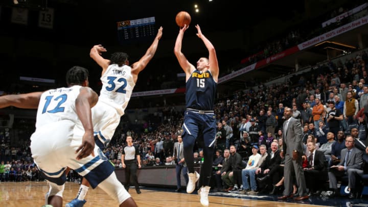 MINNEAPOLIS, MN - NOVEMBER 10: Nikola Jokic #15 of the Denver Nuggets shoots the shot to win the game against the Minnesota Timberwolves. on November 10, 2019 at Target Center in Minneapolis, Minnesota. NOTE TO USER: User expressly acknowledges and agrees that, by downloading and or using this Photograph, user is consenting to the terms and conditions of the Getty Images License Agreement. Mandatory Copyright Notice: Copyright 2019 NBAE (Photo by David Sherman/NBAE via Getty Images)
