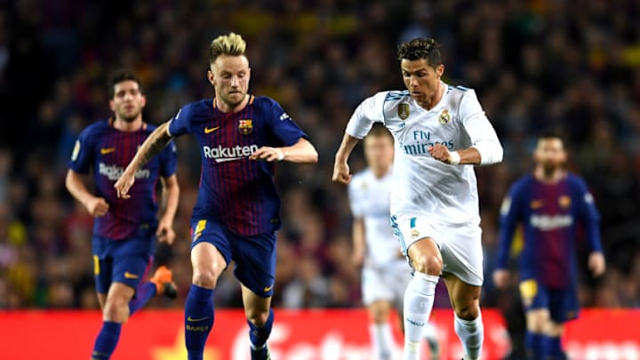 BARCELONA, SPAIN - MAY 06: Cristiano Ronaldo of Real Madrid is chased by Ivan Rakitic of Barcelona during the La Liga match between Barcelona and Real Madrid at Camp Nou on May 6, 2018 in Barcelona, Spain. (Photo by David Ramos/Getty Images)