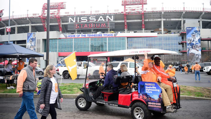Fans arrive to the 2021 Music City Bowl NCAA college football game at Nissan Stadium in Nashville, Tenn. on Thursday, Dec. 30, 2021.Kns Tennessee Purdue