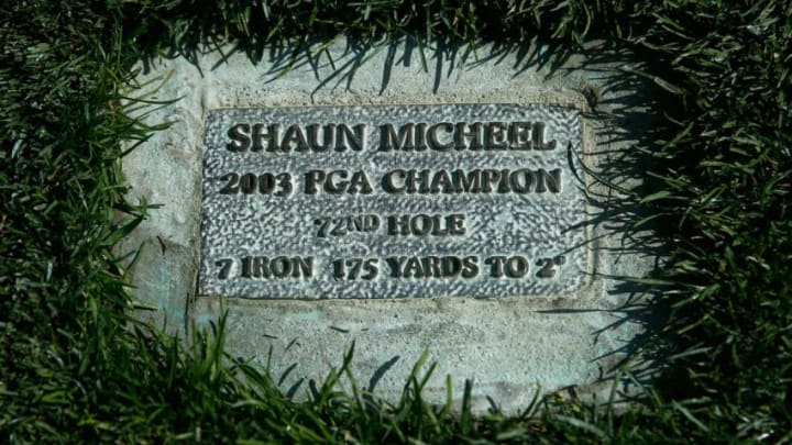 ROCHESTER, NY – AUGUST 05: A plaque is seen in the rough on the 18th hole to commemorate the 7-iron shot that Shaun Micheel struck from 174 yards during the 2003 PGA Championship during a practice round prior to the start of the 95th PGA Championship at Oak Hill Country Club on August 5, 2013 in Rochester, New York. (Photo by Scott Halleran/Getty Images)