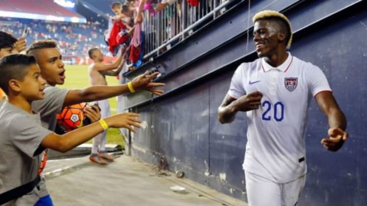 Jul 10, 2015; Foxborough, MA, USA; Young fans ask United States forward Gyasi Zardes (20) for autographs after a CONCACAF Gold Cup group play game against Haiti at Gillette Stadium. Mandatory Credit: Winslow Townson-USA TODAY Sports