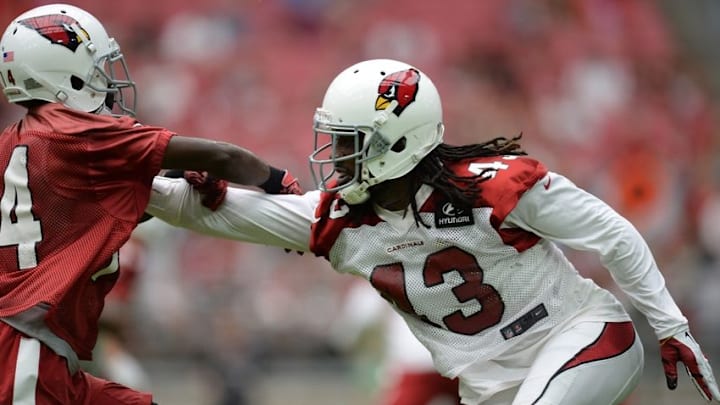 Jul 29, 2016; Glendale, AZ, USA; Arizona Cardinals cornerback Mike Jenkins (43) jams Cardinals wide receiver J.J. Nelson (14) at the line of scrimmage during training camp at University of Phoenix Stadium. Mandatory Credit: Joe Camporeale-USA TODAY Sports
