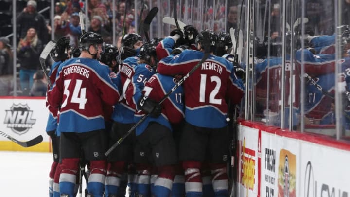 DENVER, CO - JANUARY 02: Members of the Colorado Avalanche celebrate an overtime win against the Winnipeg Jets at the Pepsi Center on January 2, 2018 in Denver, Colorado. The Avalanche defeated the Jets 3-2 in overtime. (Photo by Michael Martin/NHLI via Getty Images)
