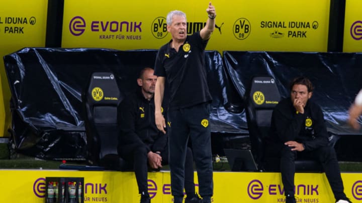 Lucien Favre saw his side suffer a damaging defeat to Mainz (Photo by GUIDO KIRCHNER/POOL/AFP via Getty Images)