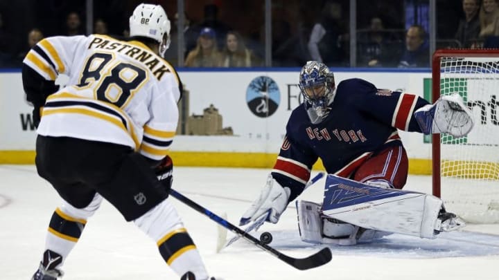Oct 26, 2016; New York, NY, USA; New York Rangers goalie Henrik Lundqvist (30) makes a save against Boston Bruins right wing David Pastrnak (88) during the third period at Madison Square Garden. Mandatory Credit: Adam Hunger-USA TODAY Sports