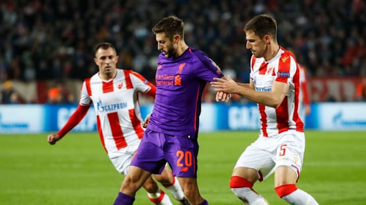 BELGRADE, SERBIA - NOVEMBER 06: Adam Lallana (L) of Liverpool in action against Milos Degenek (R) of Crvena Zvezda during the Group C match of the UEFA Champions League between Red Star Belgrade and Liverpool at Rajko Mitic Stadium on November 06, 2018 in Belgrade, Serbia. (Photo by Srdjan Stevanovic/Getty Images)