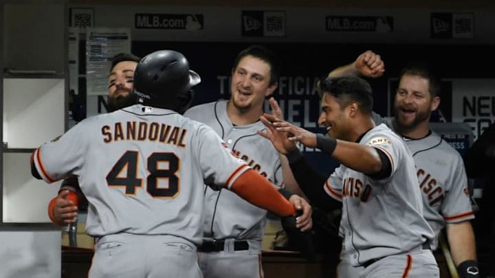 SAN DIEGO, CA - JULY 3: Pablo Sandoval #48 of the San Francisco Giants is congratulated after scoring in the sixth inning against the San Diego Padres at Petco Park July 3, 2019 in San Diego, California. (Photo by Denis Poroy/Getty Images)