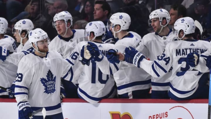 MONTREAL, QC - APRIL 06: William Nylander #29 of the Toronto Maple Leafs celebrates a second period goal with teammates on the bench against the Montreal Canadiens during the NHL game at the Bell Centre on April 6, 2019 in Montreal, Quebec, Canada. (Photo by Minas Panagiotakis/Getty Images)