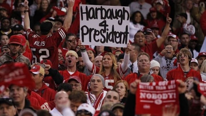 Jan 14, 2012; San Francisco, CA, USA; San Francisco 49ers fan holds up a sign for head coach Jim Harbaugh (not pictured) during the fourth quarter of the 2011 NFC divisional playoff game against the New Orleans Saints at Candlestick Park. The 49ers defeated the Saints 36-32. Mandatory Credit: Cary Edmondson-USA TODAY Sports