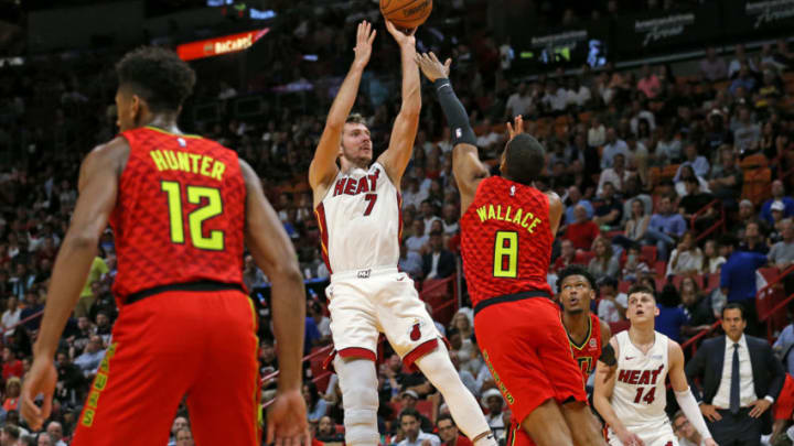 Miami Heat guard Goran Dragic (7) shoots over Atlanta Hawks guard Tyrone Wallace (8) (David Santiago/Miami Herald/Tribune News Service via Getty Images)