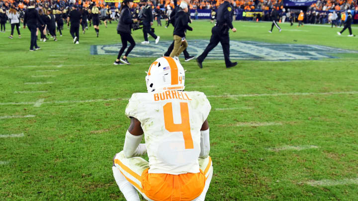 Dec 30, 2021; Nashville, TN, USA; Tennessee Volunteers defensive back Warren Burrell (4) reacts after losing against the Purdue Boilermakers in overtime in the 2021 Music City Bowl at Nissan Stadium. Mandatory Credit: Christopher Hanewinckel-USA TODAY Sports