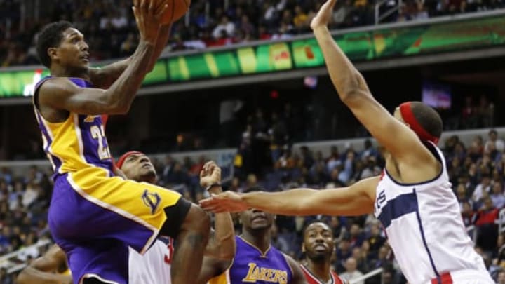 Dec 2, 2015; Washington, DC, USA; Los Angeles Lakers guard Louis Williams (23) shoots the ball as Washington Wizards guard 