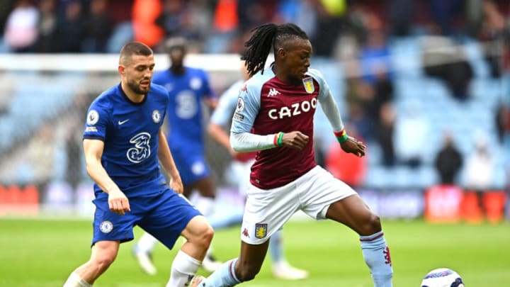 BIRMINGHAM, ENGLAND – MAY 23: Bertrand Traore of Aston Villa runs with the ball whilst under pressure from Mateo Kovacic of Chelsea during the Premier League match between Aston Villa and Chelsea at Villa Park on May 23, 2021 in Birmingham, England. A limited number of fans will be allowed into Premier League stadiums as Coronavirus restrictions begin to ease in the UK. (Photo by Clive Mason/Getty Images)