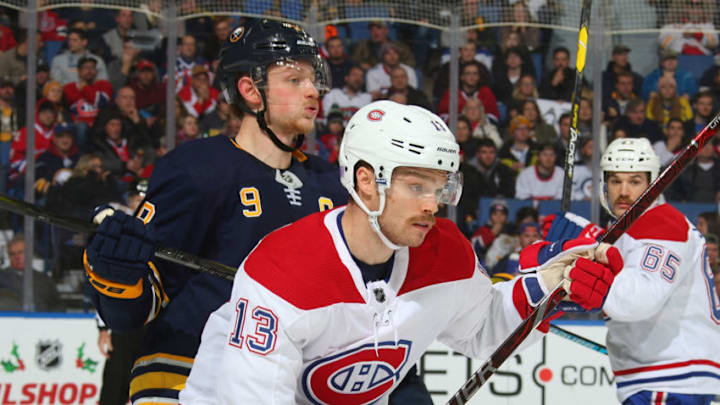 BUFFALO, NY - NOVEMBER 23: Max Domi #13 of the Montreal Canadiens skates against Jack Eichel #9 of the Buffalo Sabres during an NHL game on November 23, 2018 at KeyBank Center in Buffalo, New York. (Photo by Rob Marczynski/NHLI via Getty Images)