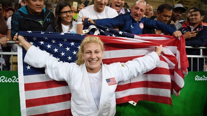 Aug 11, 2016; Rio de Janeiro, Brazil; Kayla Harrison (USA, white) reacts with fans after defeating Audrey Tcheumeo (FRA) in the women