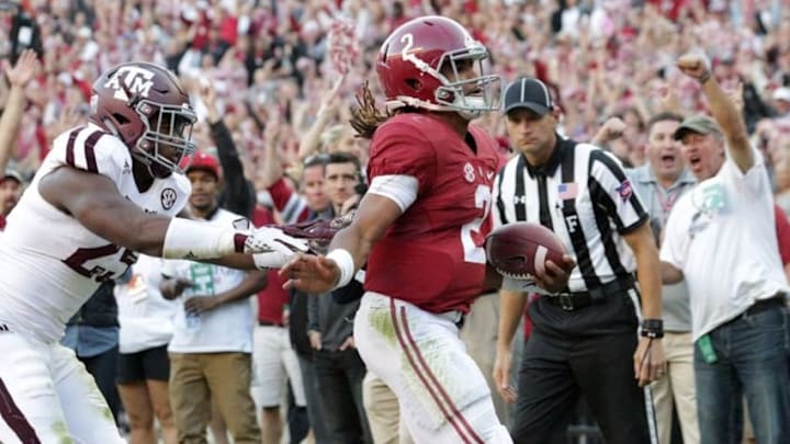Oct 22, 2016; Tuscaloosa, AL, USA; Alabama Crimson Tide quarterback Jalen Hurts (2) scores against Texas A&M Aggies at Bryant-Denny Stadium. Mandatory Credit: Marvin Gentry-USA TODAY Sports