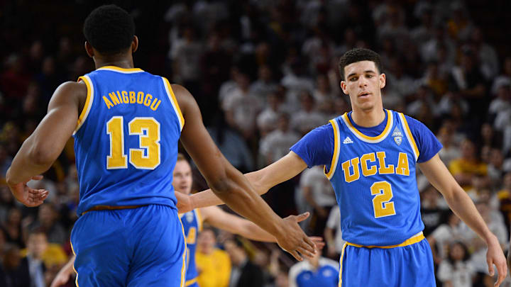 Feb 23, 2017; Tempe, AZ, USA; UCLA Bruins guard Lonzo Ball (2) celebrates with UCLA Bruins forward Ike Anigbogu (13) during the first half against the Arizona State Sun Devils at Wells-Fargo Arena. Mandatory Credit: Joe Camporeale-USA TODAY Sports