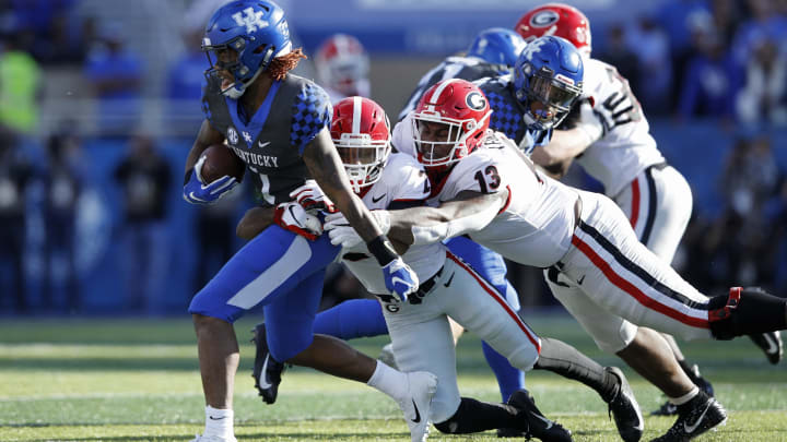 LEXINGTON, KY – NOVEMBER 03: J.R. Reed #20 and Jonathan Ledbetter #13 (Photo by Joe Robbins/Getty Images)