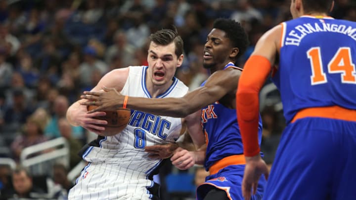 Orlando Magic guard-forward Mario Hezonja (8) and New York Knicks guard Justin Holiday (8) on Monday, March 6, 2017 at Amway Center in Orlando, Fla. (Ricardo Ramirez Buxeda/Orlando Sentinel/TNS via Getty Images)