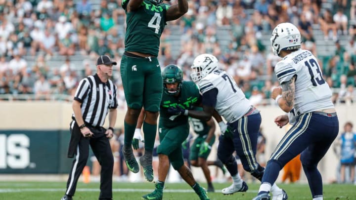 Michigan State linebacker Jacoby Windmon (4) blocks a pass from Akron quarterback Jeff Undercuffler Jr. (13) during the second half at Spartan Stadium in East Lansing on Saturday, Sept. 10, 2022.