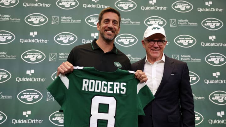 New York Jets quarterback Aaron Rodgers poses with team owner Woody Johnson during an introductory press conference at Atlantic Health Jets Training Center on April 26, 2023 in Florham Park, New Jersey. (Photo by Elsa/Getty Images)