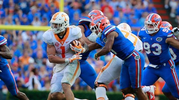 Sep 26, 2015; Gainesville, FL, USA; Tennessee Volunteers running back Jalen Hurd (1) runs with the ball as Florida Gators defensive back Vernon Hargreaves III (1) defends during the second half at Ben Hill Griffin Stadium. Florida Gators defeated the Tennessee Volunteers 28-27. Mandatory Credit: Kim Klement-USA TODAY Sports