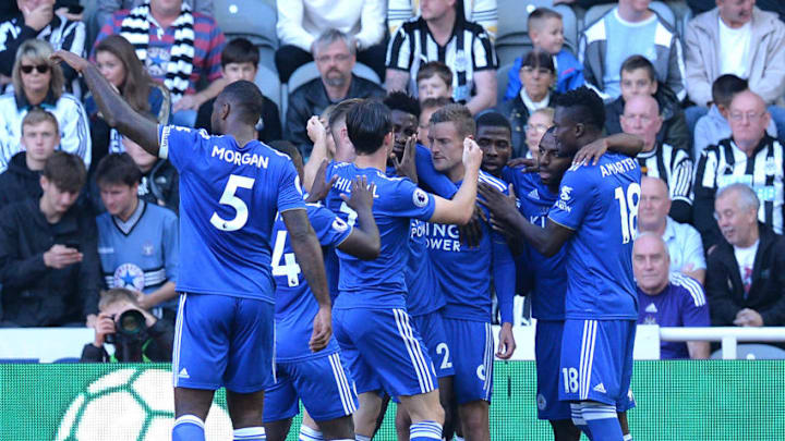 NEWCASTLE UPON TYNE, ENGLAND - SEPTEMBER 29: Jamie Vardy of Leicester City celebrates with teammates after he scores his sides first goal during the Premier League match between Newcastle United and Leicester City at St. James Park on September 29, 2018 in Newcastle upon Tyne, United Kingdom. (Photo by Mark Runnacles/Getty Images)