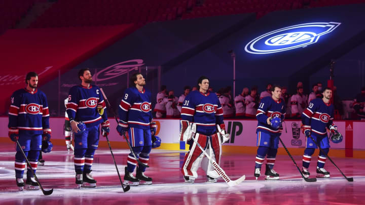 MONTREAL, QC – FEBRUARY 04: (L-R) Phillip Danault #24, Shea Weber #6, Ben Chiarot #8, Carey Price #31, Brendan Gallagher #11 and Tomas Tatar #90 of the Montreal Canadiens stand for the national anthem prior to their game against the Ottawa Senators at the Bell Centre on February 4, 2021 in Montreal, Canada. The Ottawa Senators defeated the Montreal Canadiens 3-2. (Photo by Minas Panagiotakis/Getty Images)