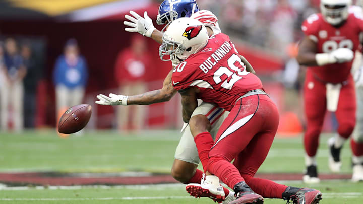 GLENDALE, AZ – DECEMBER 24: Wide receiver Roger Lewis #18 of the New York Giants fumbles the football as inside linebacker Deone Bucannon #20 of the Arizona Cardinals makes the hit in the first half at University of Phoenix Stadium on December 24, 2017 in Glendale, Arizona. (Photo by Christian Petersen/Getty Images)